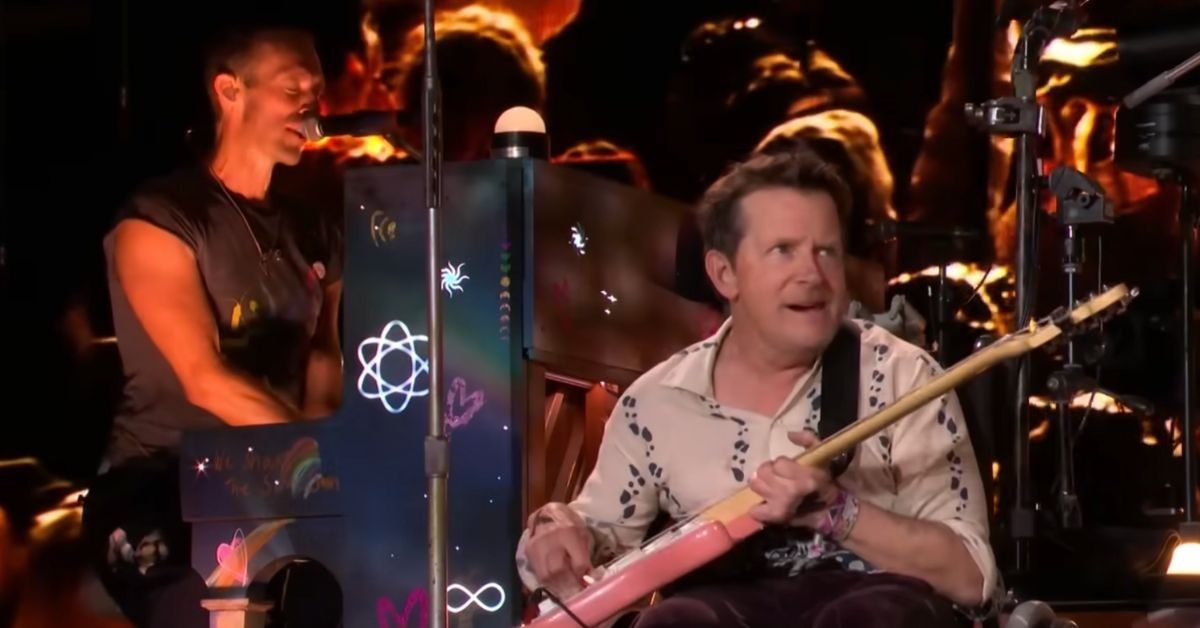 Chris Martin at the piano and Michael J. Fox on guitar